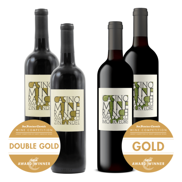 Four bottles of red wine are displayed, with two labels reading "Zinfandel" and two "Mourvèdre." Award medals are shown for each: Double Gold and Gold from the San Francisco Chronicle Wine Competition.